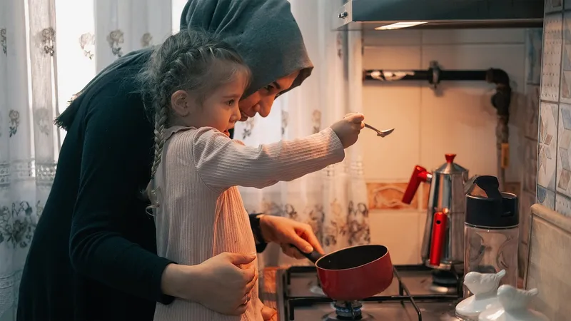 Mother and daughter, cooking, kitchen, family