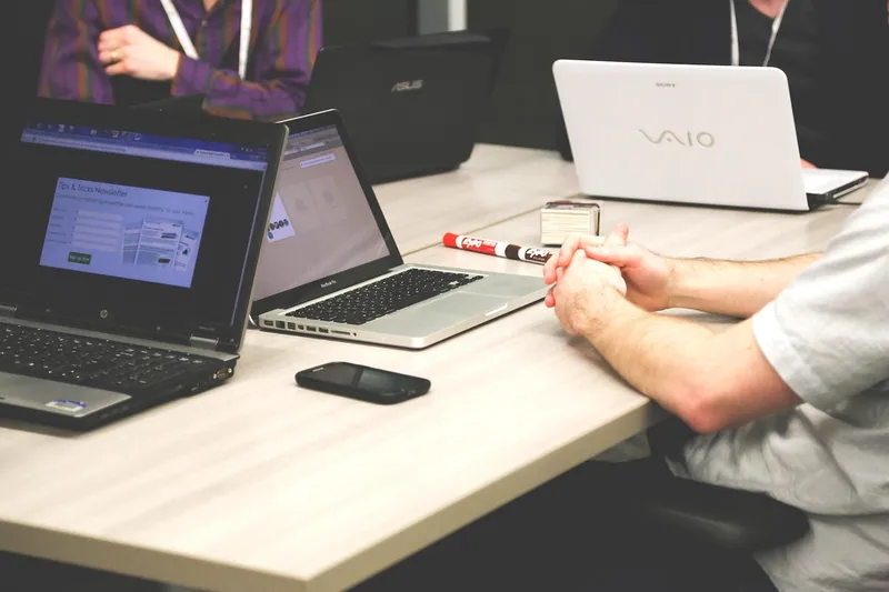 Laptops, meeting, businessmen, coworkers