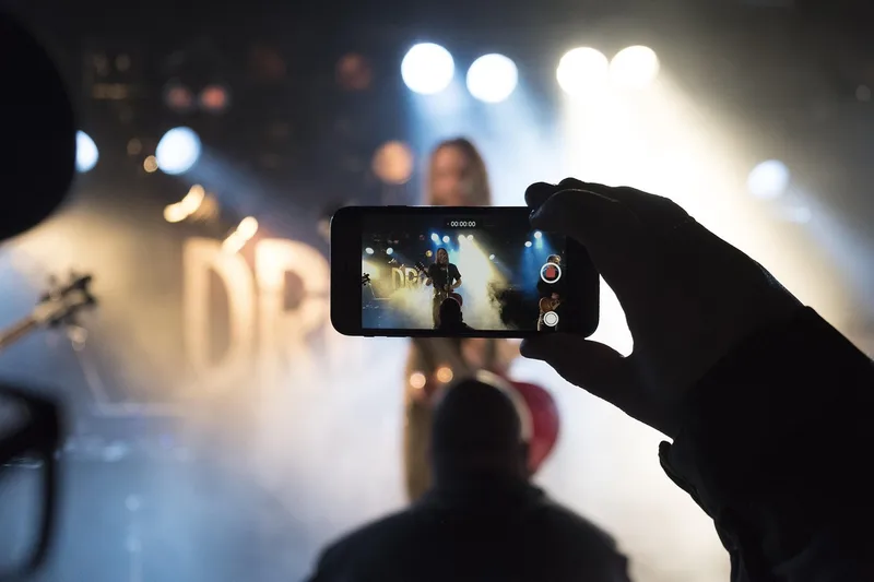 Concert, rock band, singing, cellphone